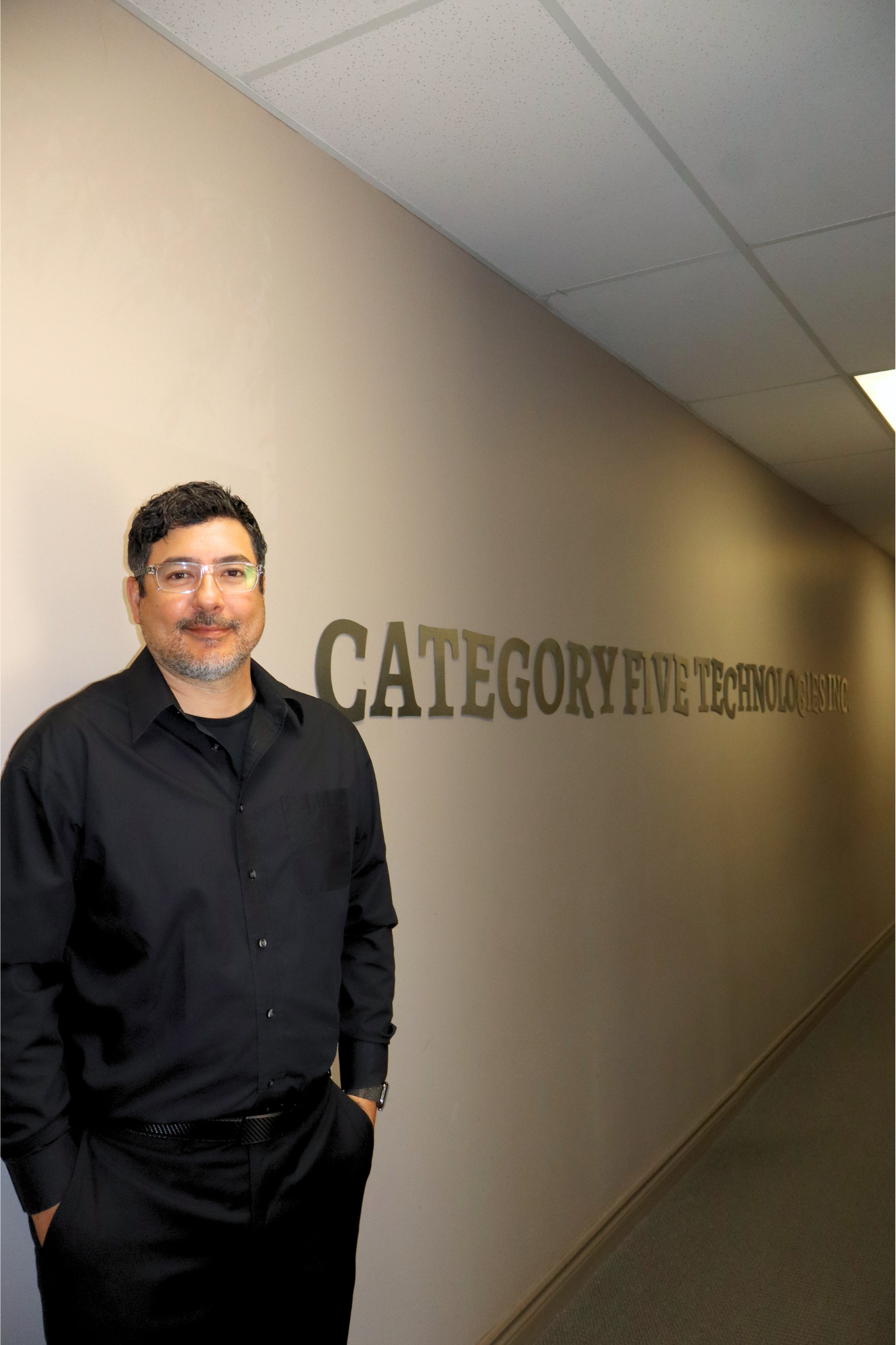 Anthony DiCicco, founder of Category Five Technologies, in the Livonia office