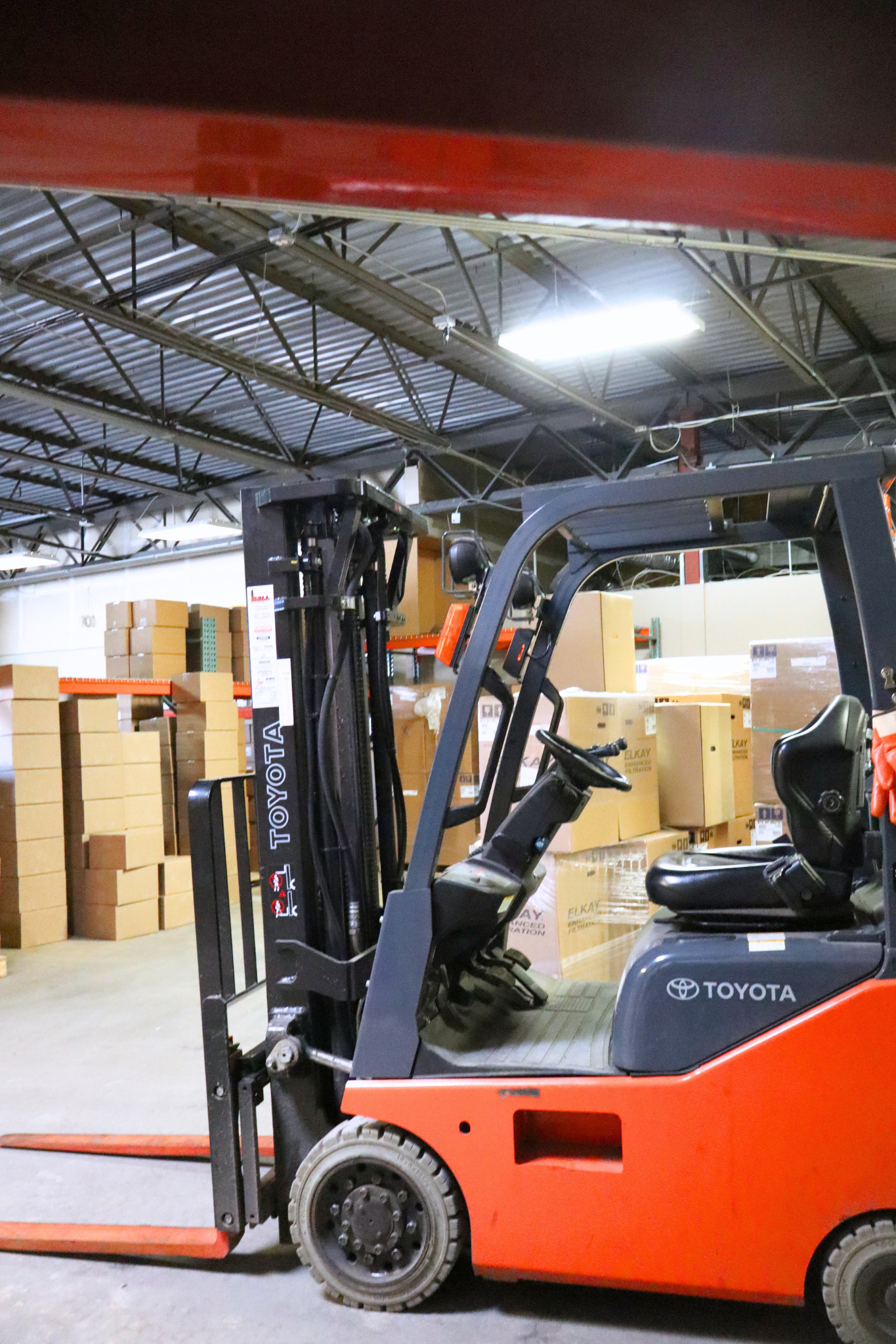 Toyota forklift operating in the Category Five Technologies fulfillment warehouse